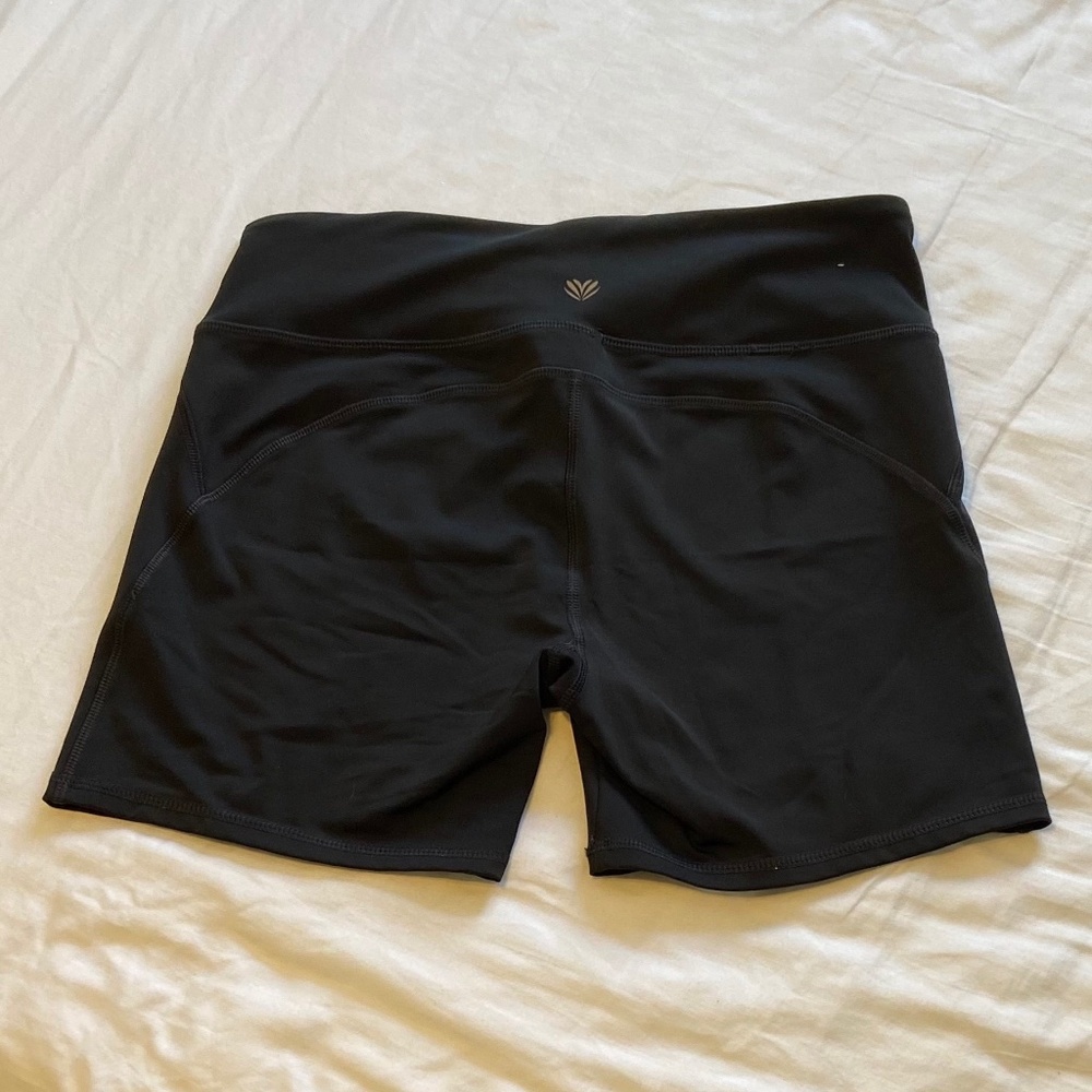 Black athletic shorts, size L.